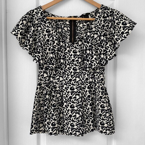 🎬✨ Umbrella Academy - H&M - White and Black Leopard Print Peplum - Picture 1 of 7
